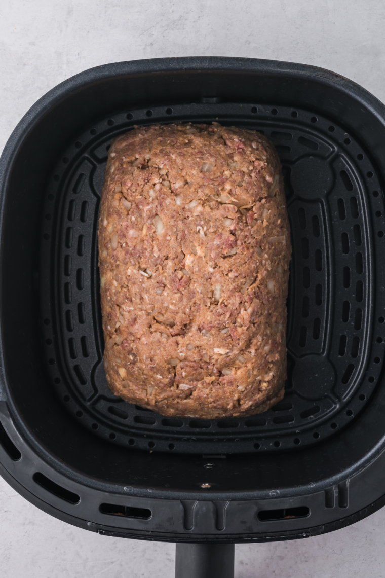 "Air frying the Spicy Jammin' Meatloaf in the air fryer."