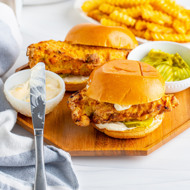 Creamy Popeyes blackened ranch sauce served as a dipping sauce with chicken tenders and fries, rich and smoky Cajun flavor.