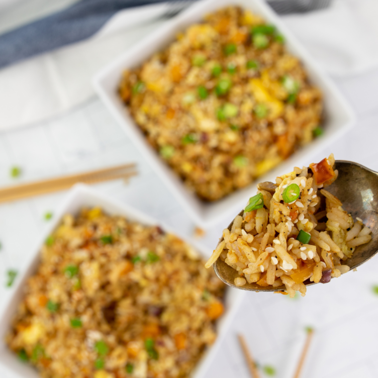 A delicious bowl of Subgum Fried Rice with colorful vegetables, protein, and savory sauce, served as a quick and satisfying meal.