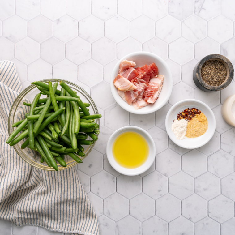 Ingredients needed for Texas Roadhouse Green Beans on table.