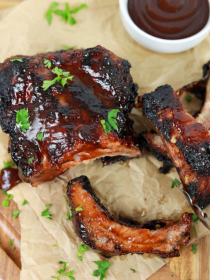 Homemade Wendy’s BBQ Sauce in a small bowl with fries and nuggets for dipping."