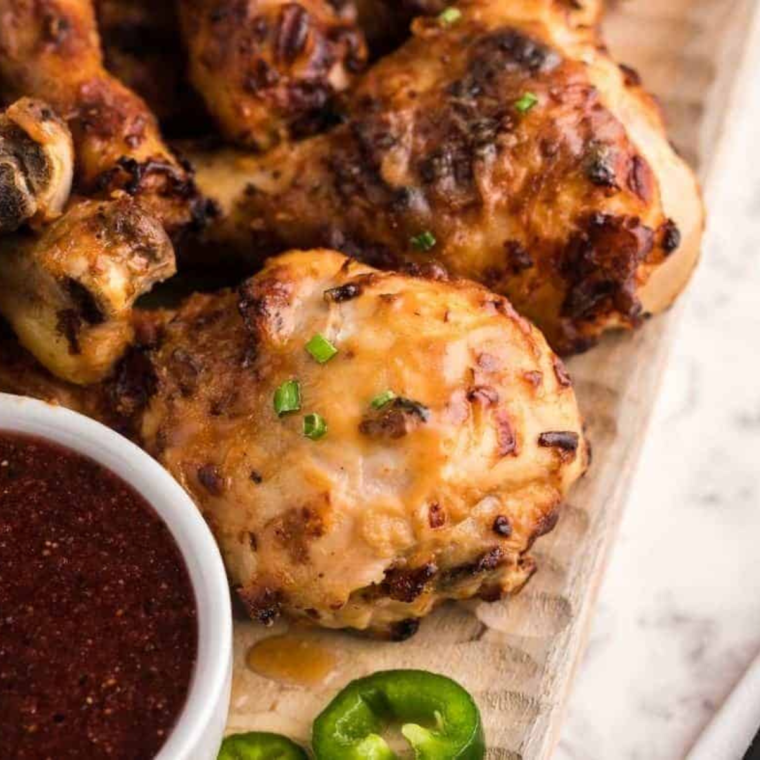 A bowl of homemade Wendy's BBQ Sauce with fresh ingredients like ketchup, honey, and spices.