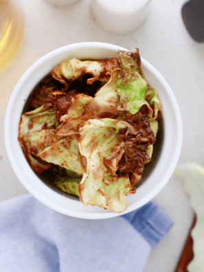"Golden and crispy Air Fryer Cabbage Chips served in a bowl."