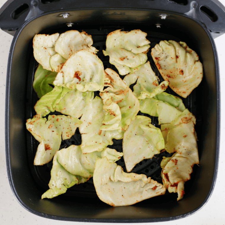 Golden, crispy Air Fryer Cabbage Chips served in a bowl.
