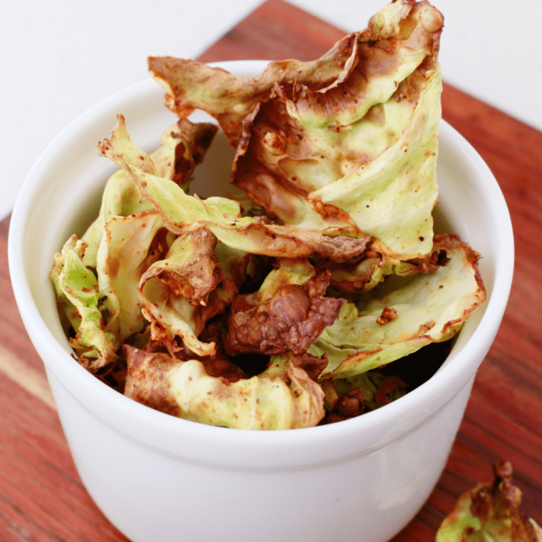 Crunchy and golden Air Fryer Cabbage Chips served in a bowl.