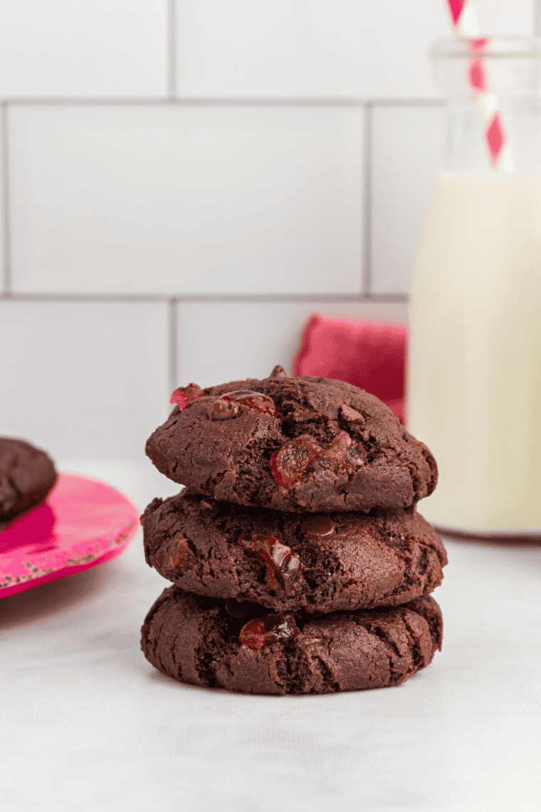Air Fryer Chocolate Cherry Cookies with gooey chocolate chips and chopped candied cherries, freshly baked and golden brown.