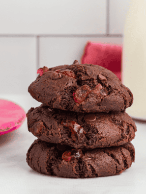 Air Fryer Chocolate Cherry Cookies fresh out of the air fryer, showing their gooey chocolate centers and chewy texture with vibrant cherry pieces.