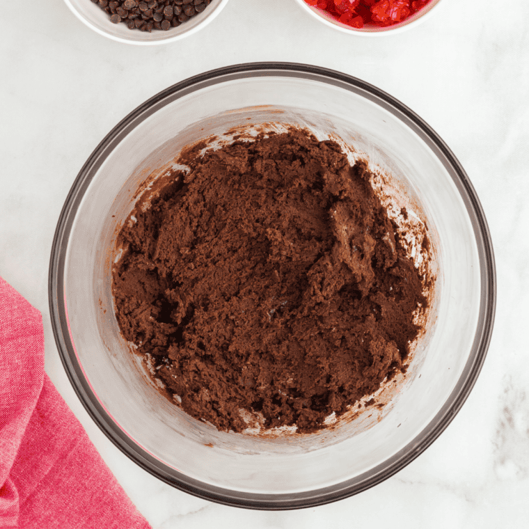 Butter, granulated sugar, and brown sugar beaten together with egg and vanilla until light and fluffy, then dry ingredients added.