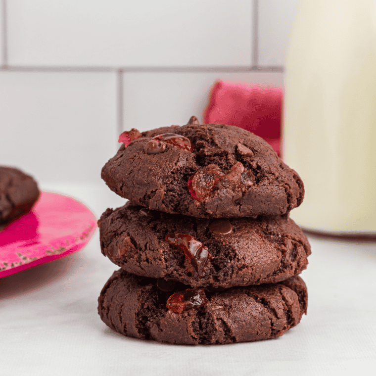 Air Fryer Chocolate Cherry Cookies fresh out of the air fryer, showing their gooey chocolate centers and chewy texture with vibrant cherry pieces.