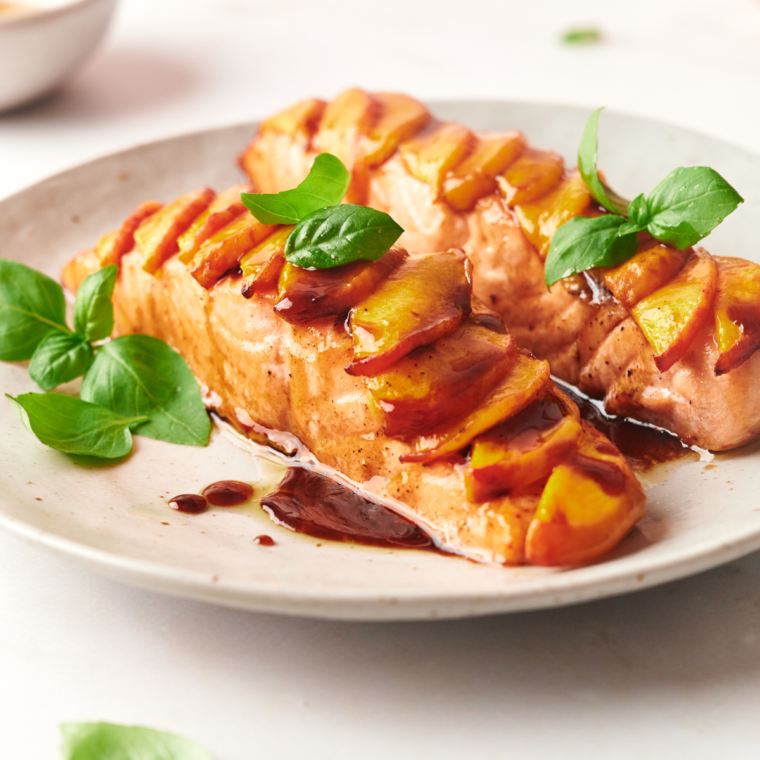 Air Fried Peach Salmon with a sweet and tangy peach glaze, served on a plate for a healthy and flavorful meal.