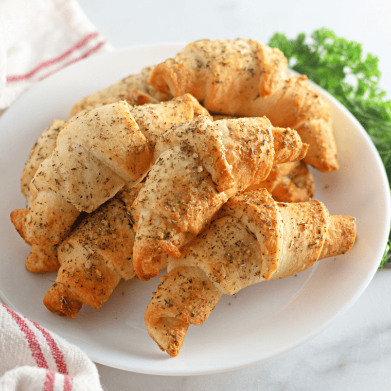 Golden, flaky Cheddar's Honey Butter Croissants brushed with a rich honey butter glaze, served fresh from the air fryer.