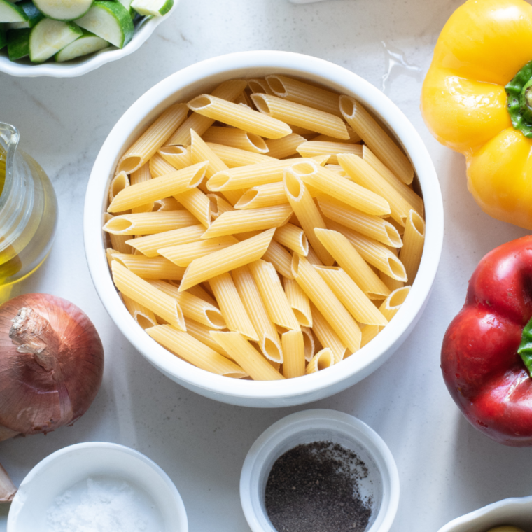 Ingredients needed for Copycat Cracker Barrel Chicken Noodle Soup Recipe on kitchen table.