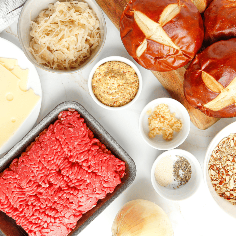 Ingredients needed for Copycat Red Robin Oktoberfest Burger Recipe on kitchen table.