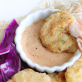 A creamy bowl of Gluten-Free Marie Rose Sauce, perfect for pairing with seafood or sandwiches.