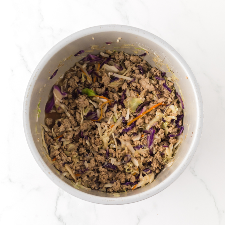 Ninja Foodi Chicken egg roll bowls are loaded with flavor and taste exactly like an egg roll, just deconstructed. This recipe is nutrient dense and easy to throw together for a quick meal!