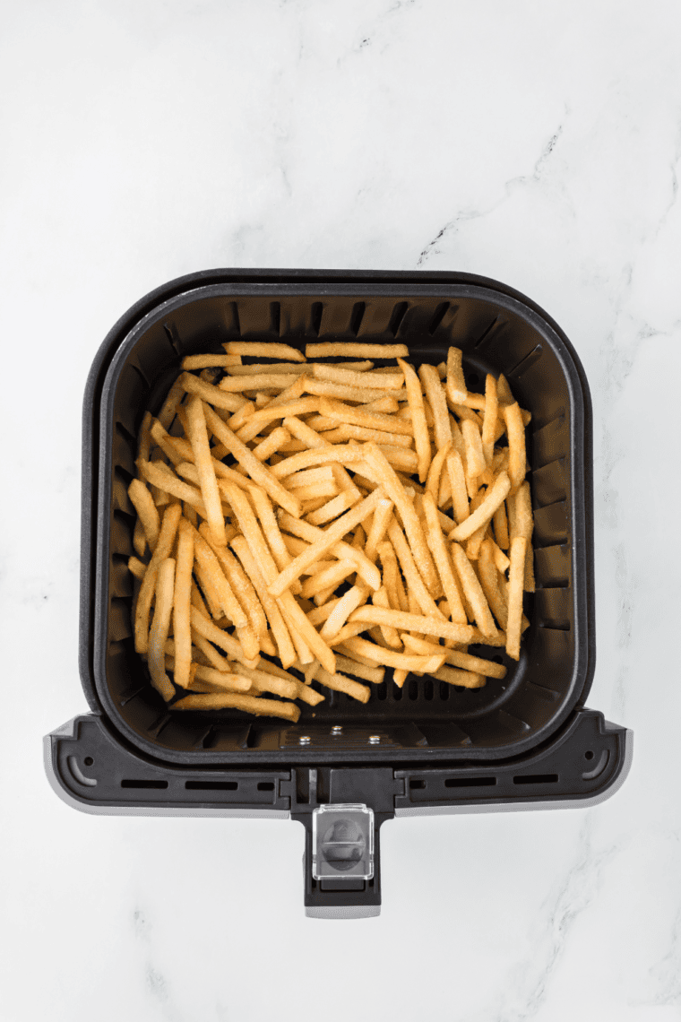 Air frying frozen steak fries at 400°F for 12-15 minutes, shaking halfway for even cooking