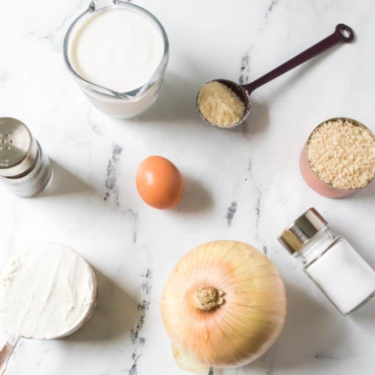 Ingredients needed for Red Robin Towering Onion Rings Recipe on kitchen table.