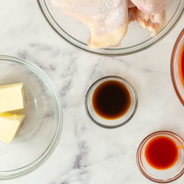 Ingredients needed for Zydeco Sauce on kitchen table.