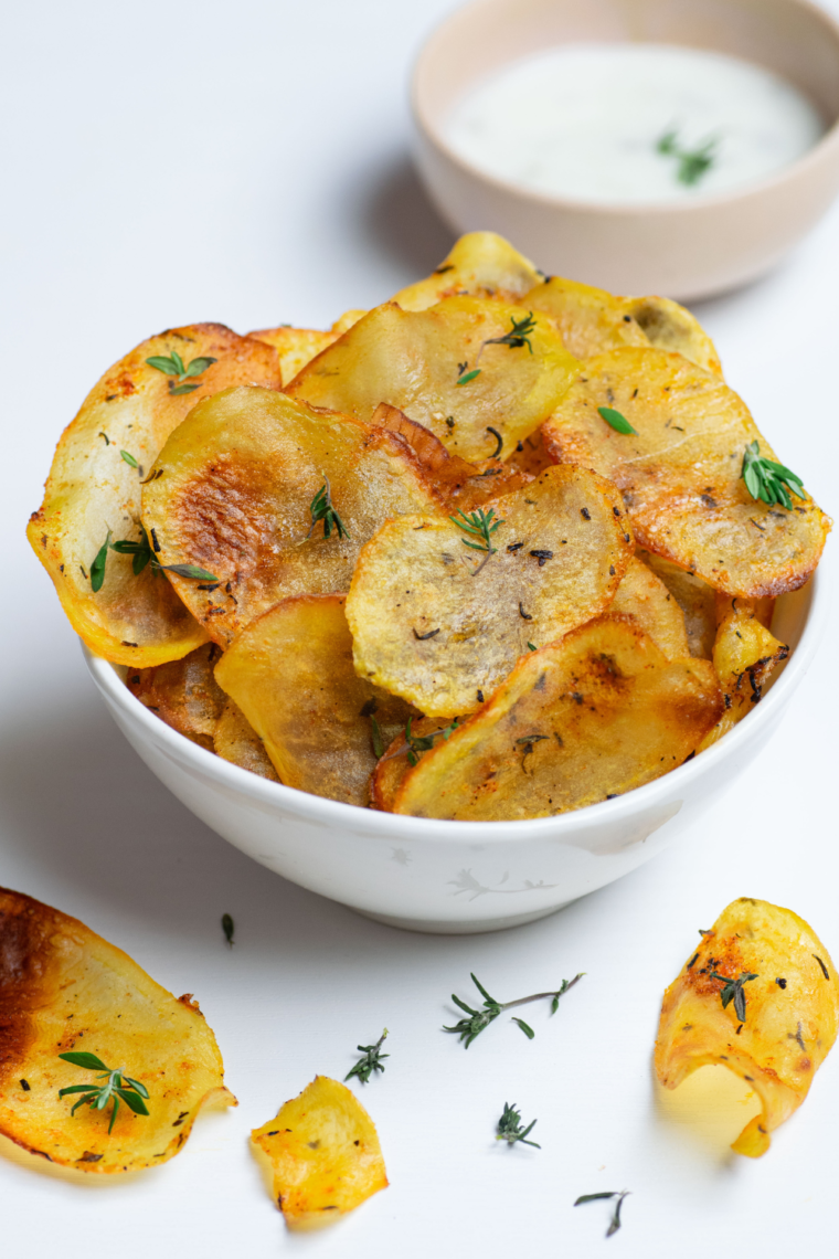 Air fryer All Dressed Potato Chips served in a bowl, a flavorful and healthier snack option.