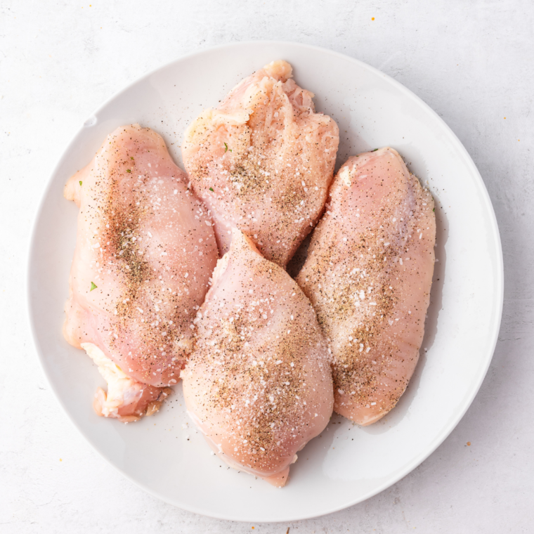 Ingredients needed for Air Fryer Bacon Wrapped Chicken Breast Recipe on kitchen table.