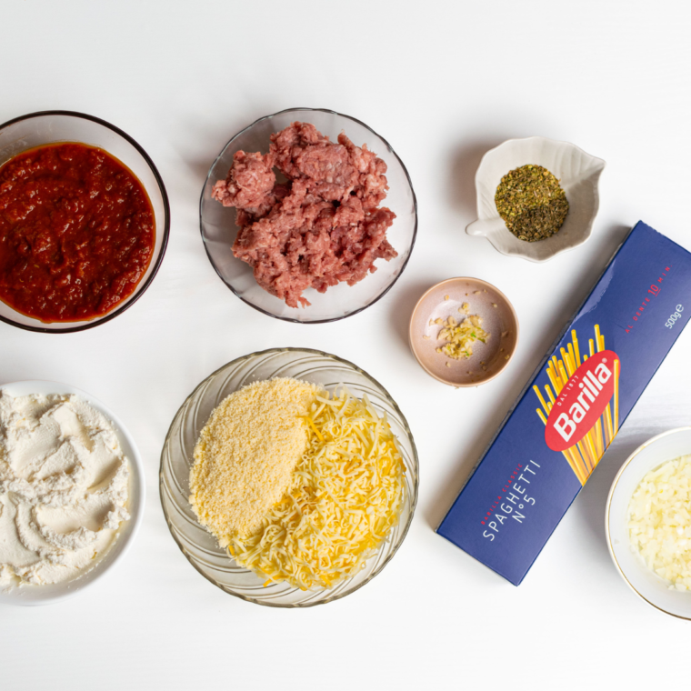 Ingredients needed for Air Fryer Baked Spaghetti on kitchen table.