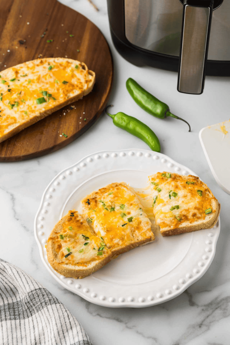 Air fried pepper and chili cheese toast on the kitchen table.