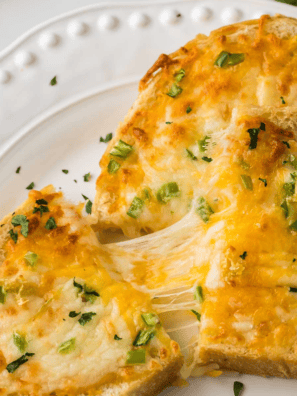 Air Fryer Chili Cheese Toast with crispy bread topped with chili and gooey melted cheese, ready for a satisfying bite.