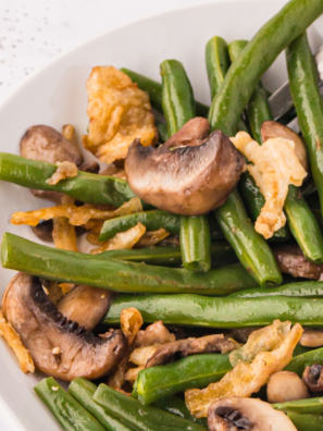 Crisp green beans, tender mushrooms, and golden caramelized onions cooked to perfection in an air fryer.