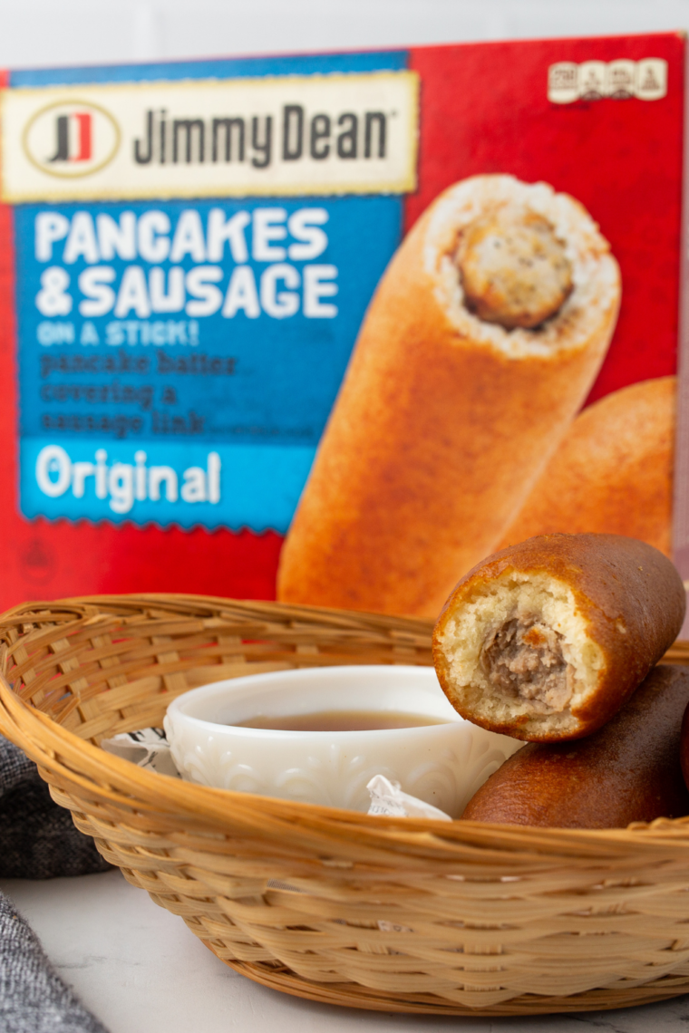 Air fryer Jimmy Dean pancakes and sausage on a stick cooked crispy and golden in air fryer basket