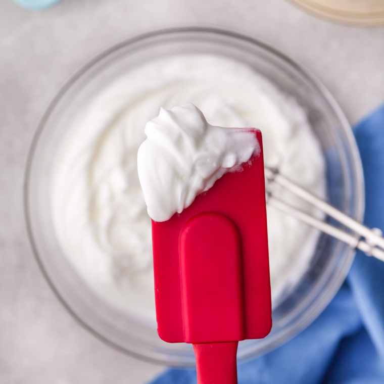 Beat the egg whites with an electric mixer until smooth, stiff peaks form, for a light and fluffy cloud-like slice of bread.