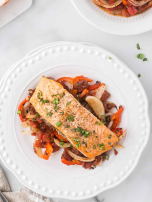 Air Fryer Salmon Cacciatore served with tomatoes, olives, and herbs for a delicious Italian-inspired dish.