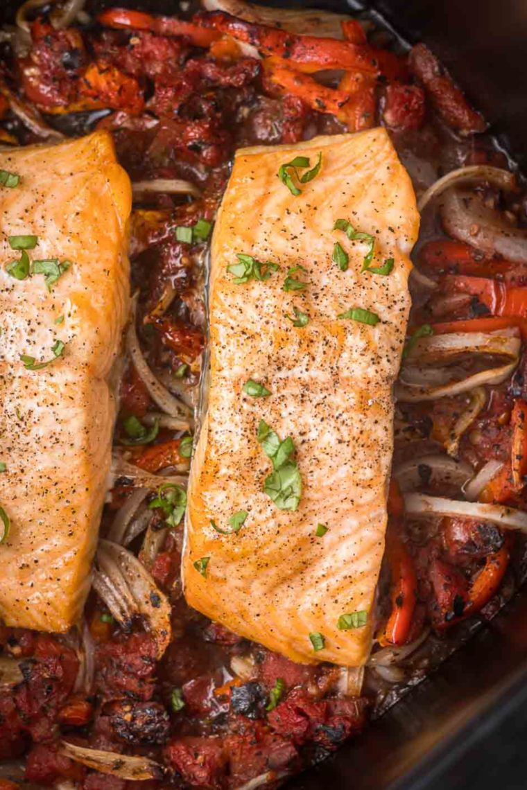 Air Fryer Salmon Cacciatore with salmon fillets, bell peppers, onions, tomatoes, and fresh basil, ready to serve.