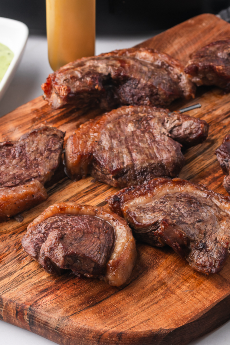 Copycat Fogo de Chão Picanha steak, seasoned with coarse salt and black pepper, cooked to perfection.