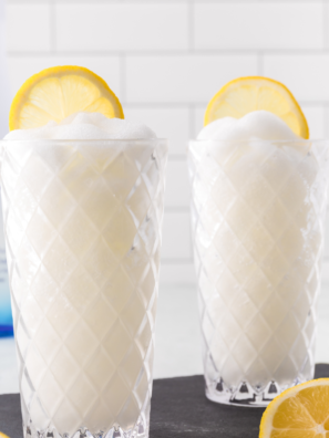 "Ninja Slushie Hard Lemonade served in a glass, icy, refreshing, and garnished with a lemon slice."