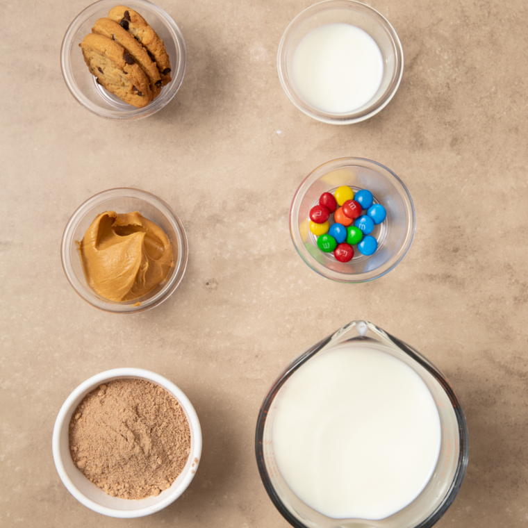 Ingredients needed for Protein Monster Cookie Ninja Creami Ice Cream Recipe on kitchen table.