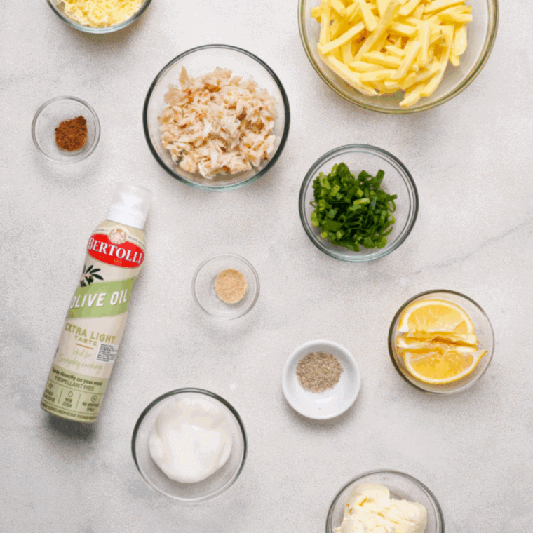 Ingredients needed for Red Lobster Crabby Cheese Fries Recipe on kitchen table.