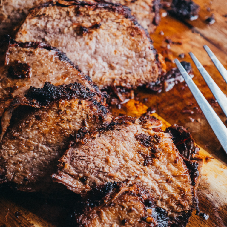 Smoked Brisket cooking on a Ninja Woodfire Grill with smoky flavor and perfect texture.