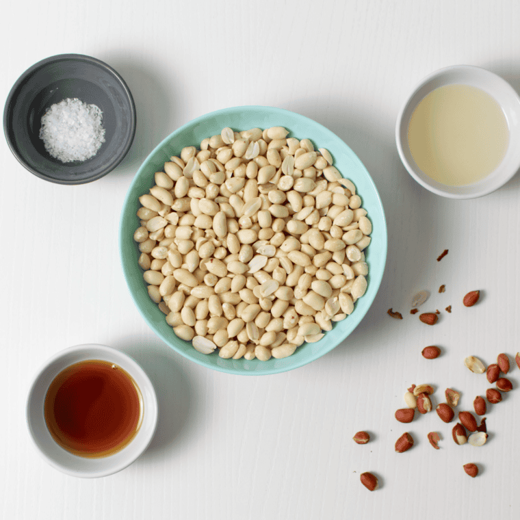 Ingredients needed for Air Fryer Homemade Peanut Butter on kitchen table.