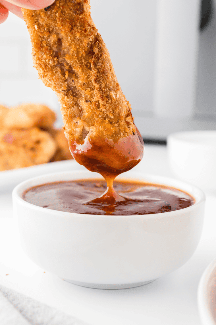 Crispy golden Air Fryer Steak Fingers served with dipping sauces.