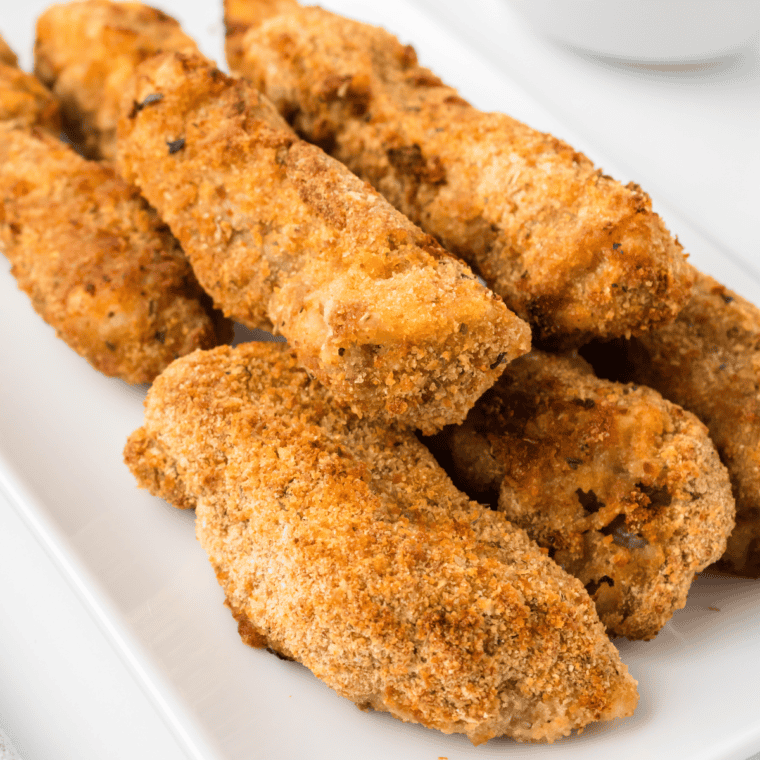 Crispy Air Fryer Steak Fingers served on a plate with dipping sauce.