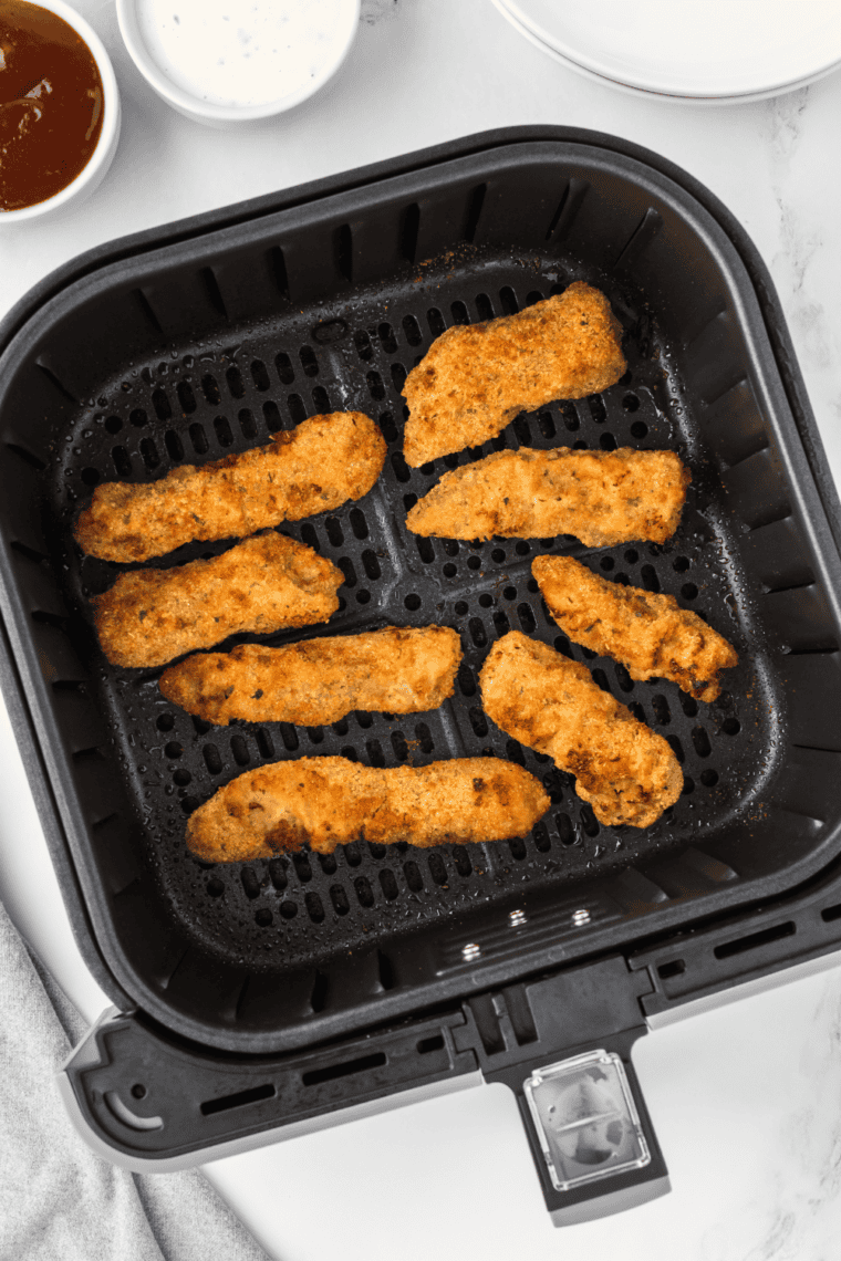 Golden and crispy Air Fryer Steak Fingers served with dipping sauces.