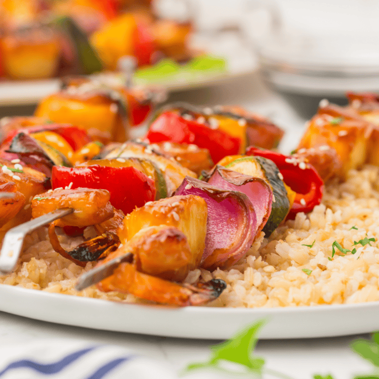 Perfectly grilled Blackstone Teriyaki Shrimp glazed with a rich teriyaki sauce.