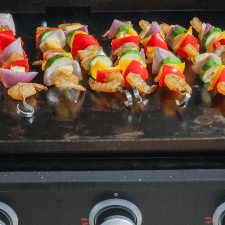 Skewered Blackstone Teriyaki Shrimp grilled to perfection with a glossy sauce.