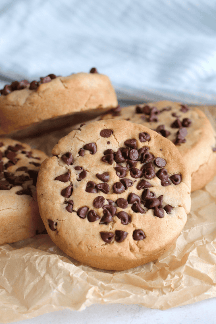 Freshly baked Brown Butter Peanut Butter Cookies with chocolate chips, golden brown and crispy on the edges.