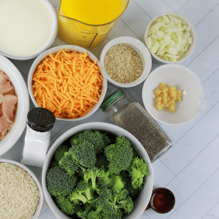 Cheddar’s Broccoli Cheese Casserole Ingredients on table.