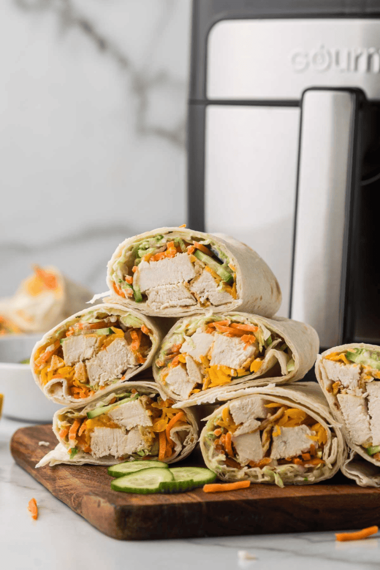 Chick-fil-A Grilled Chicken Cool Wrap filled with fresh veggies and grilled chicken, wrapped in a soft tortilla.