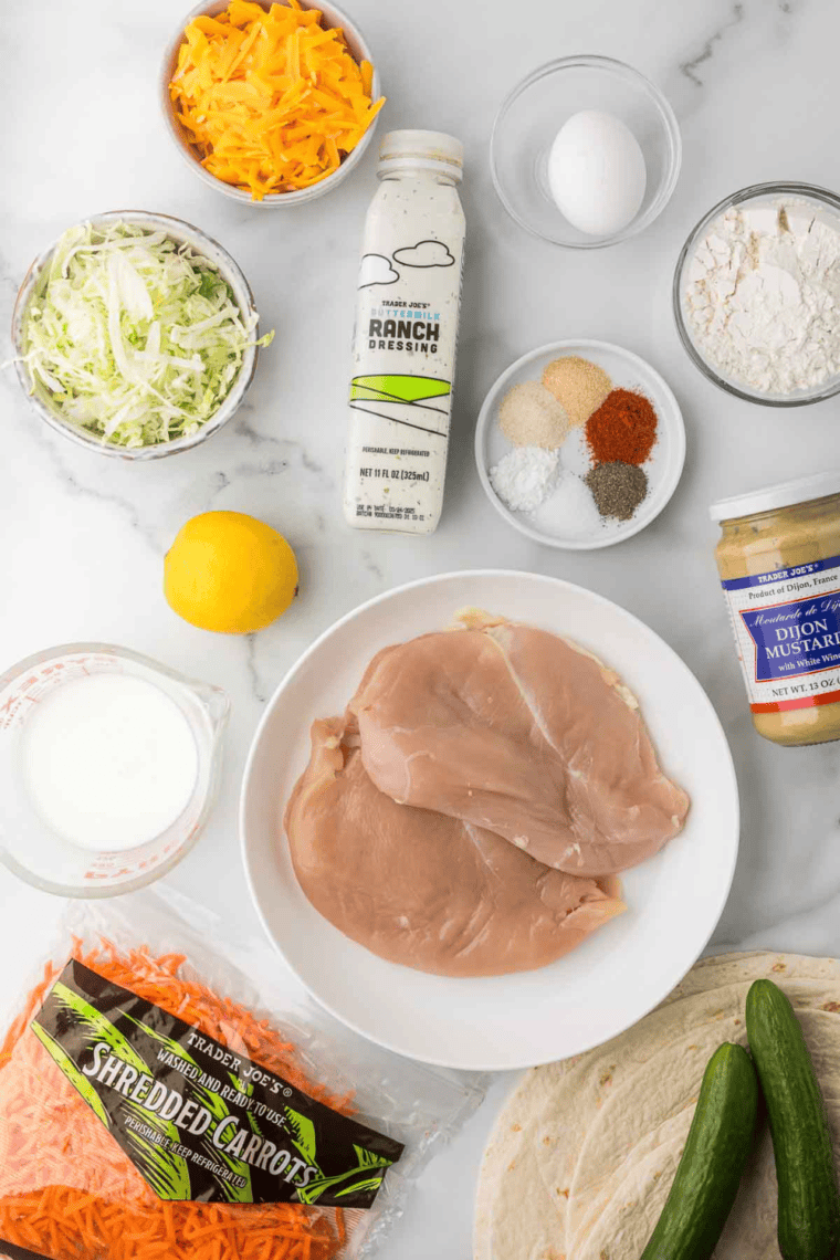 Ingredients needed for Chick-fil-A Grilled Chicken Cool Wrap Recipe on kitchen table.