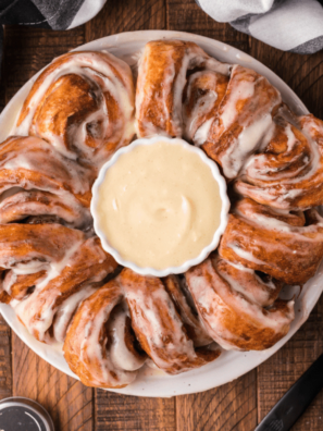 A rich, creamy bowl of Copycat Cinnabon Frosting perfect for topping cinnamon rolls or as a dip.