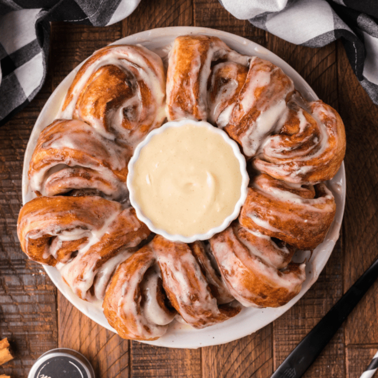 A rich, creamy bowl of Copycat Cinnabon Frosting perfect for topping cinnamon rolls or as a dip.