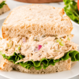 Flaky croissant filled with creamy homemade La Madeleine-style chicken salad with almonds and fresh ingredients.